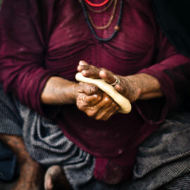 Woman shaping bread